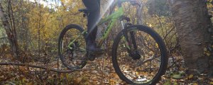 Mountain biking beside creek at RockRidge Canyon, Princeton BC