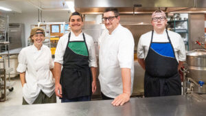 RockRidge Canyon Food Services Manager Matthew mentoring camp kitchen staff in British Columbia